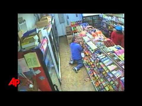 Raw Video: Shootout With Store Robbers