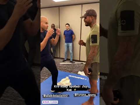Ali Abdelaziz trading Leg Kicks with Tyrone Spong