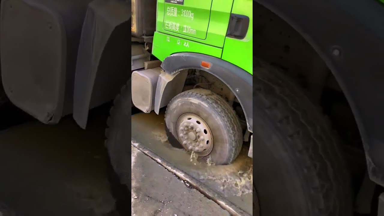 Loaded Construction Dump Truck in Forested Area in China