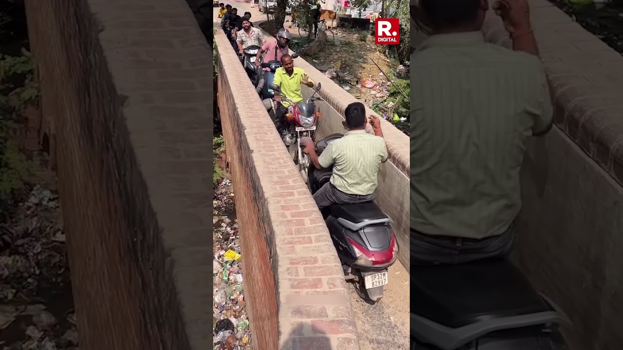 Bikers' Heated Fight Causes Traffic Jam ๐