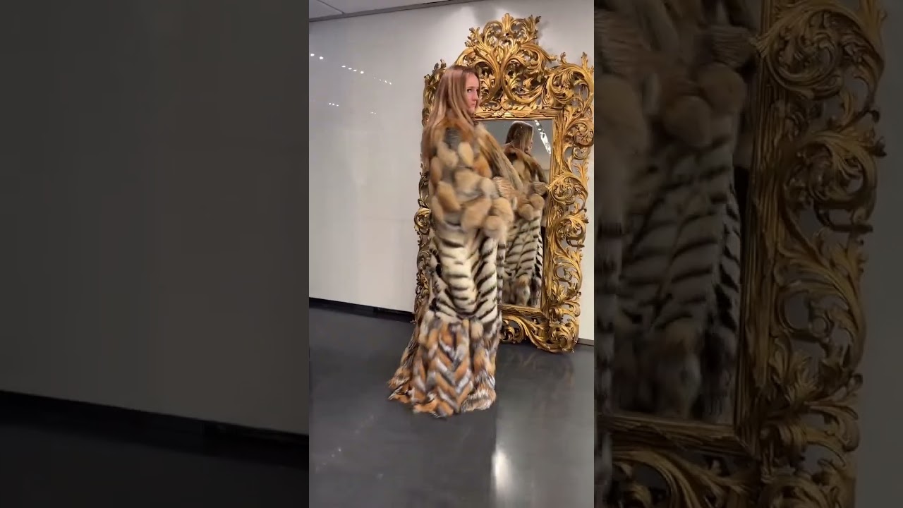 TRYING ON A FOX FUR COAT AT DOLCE&GABBANA