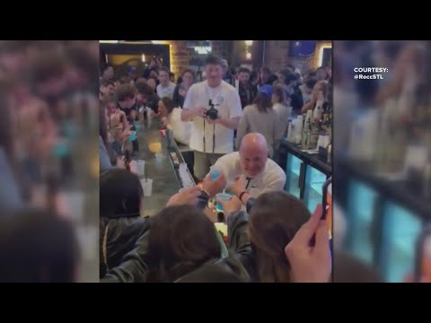 SLU head coach Josh Schertz becomes a bartender