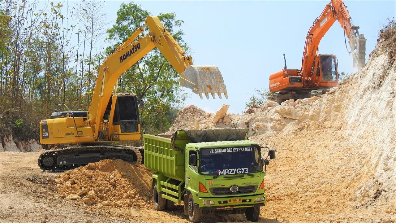 Excavator & Dump Truck Dig Limestone on Road 🚧