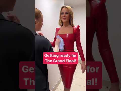 This woman has the dream job - polishing Amanda Holden's latex dress!