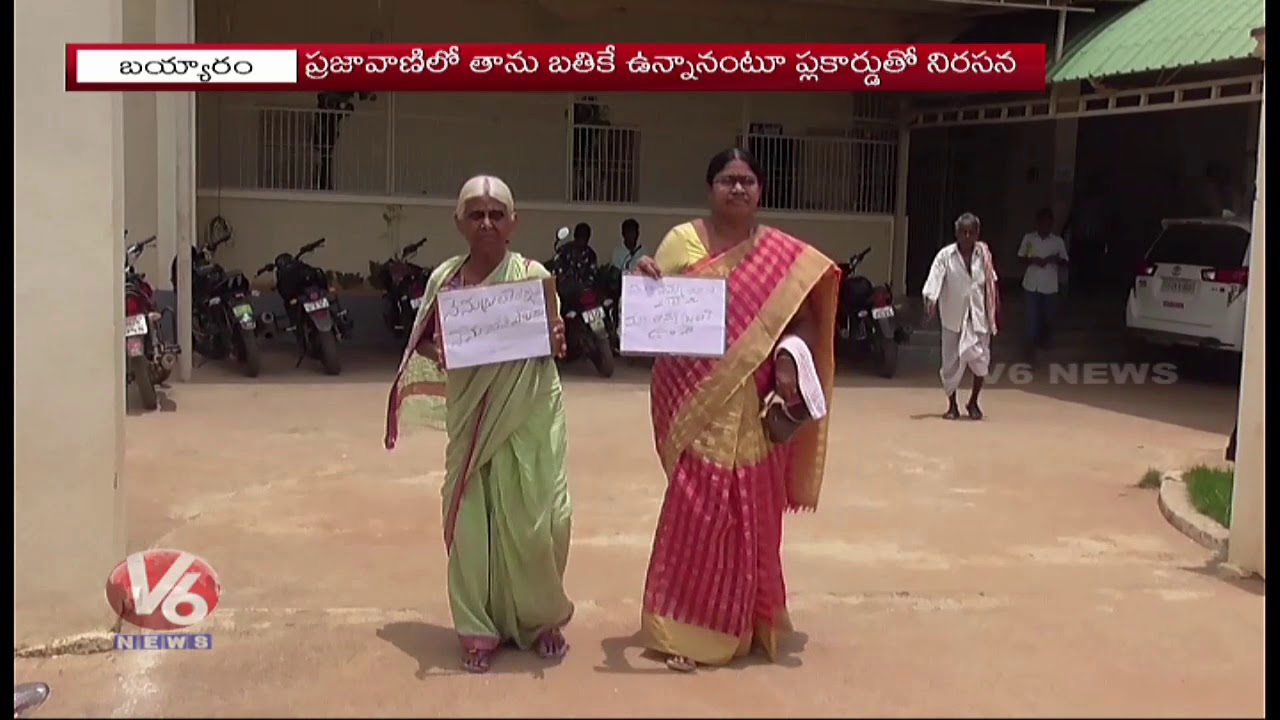 Elderly Woman Stages Protest with Flag Card Over 'I'm Alive, Not Dead' Issue | V6 News