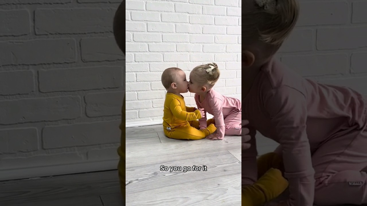 Adorable Babies Sharing Sweet Kisses π