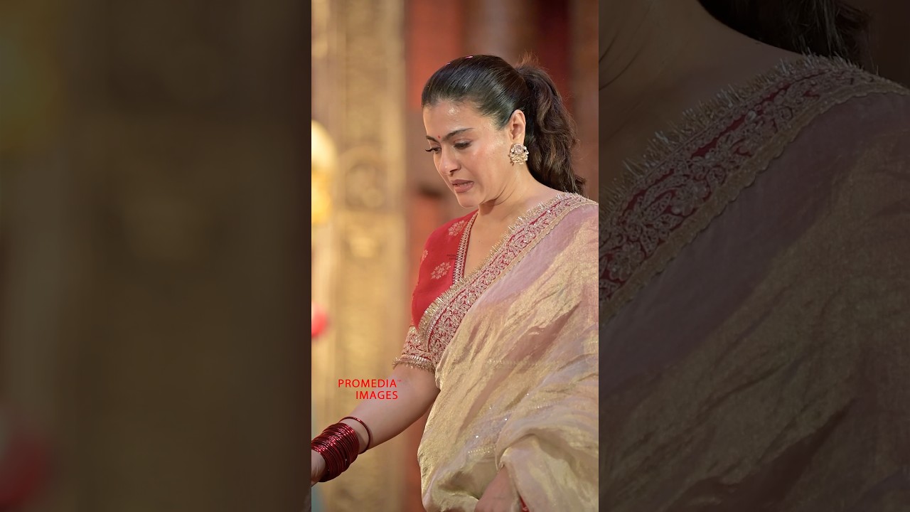 Kajol Stuns in a Cinematic Walk Amid Petals During Durga Puja Celebrations 🌸