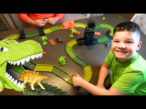 DINOSAUR RACE TRACK Toy For Kids! Caleb and DAD Race Cars to See who Wins the Game!