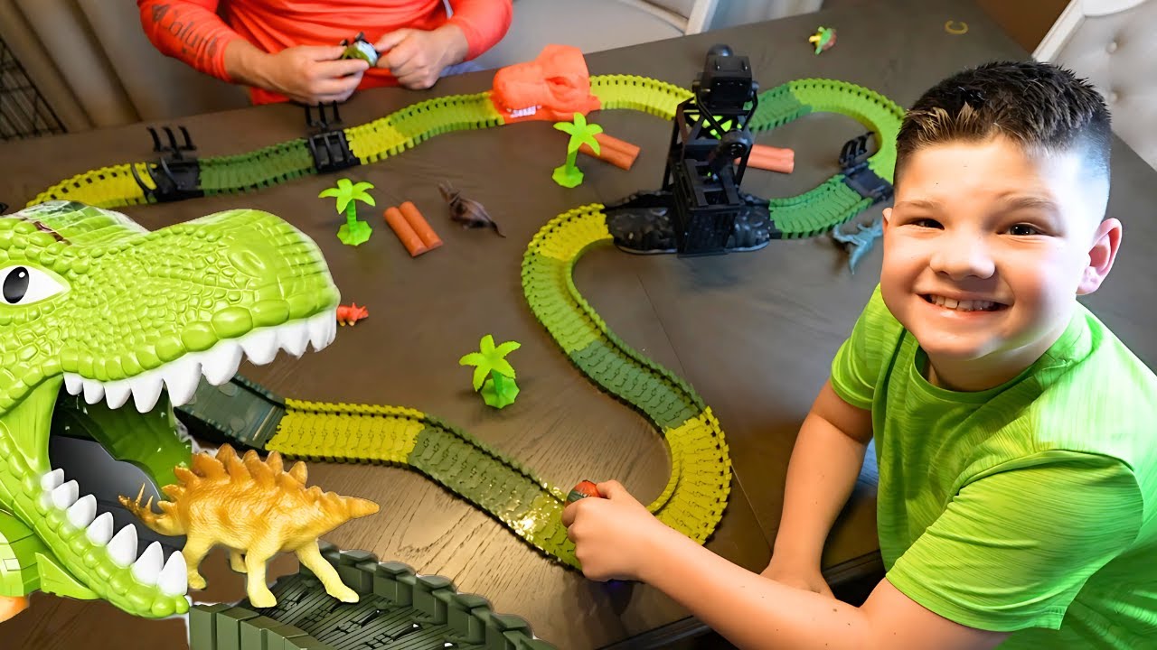 Exciting Dinosaur Race Track Toy for Kids! Caleb & Dad Compete in a Fun Car Race 🦖