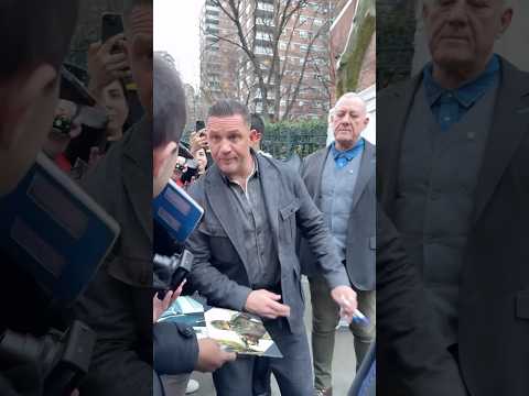 Tom Hardy “fans” took advantage of his kindness moving down in line and asking for more autographs.