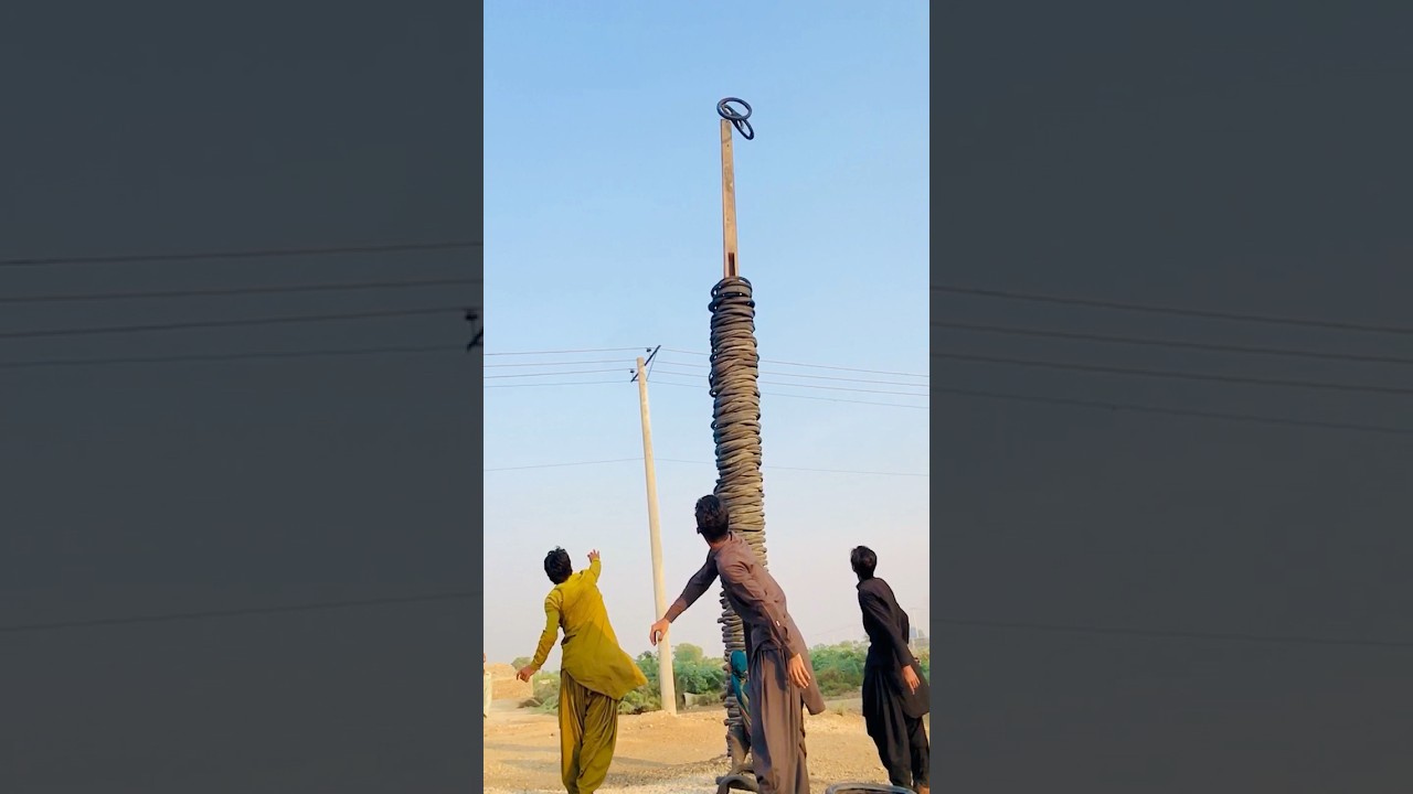 Epic Tyre Toss Challenge! Watch the Longest Throw Ever 🎯 #shorts