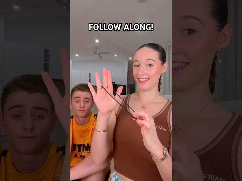 CAN YOU DO IT? đŗđ¤đ¤Ŗ VIRAL TIKTOK HAIR TIE TRICK TUTORIAL? đ #shorts #viral #trend #tutorial