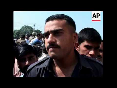 AP pix of attack on police academy, siege