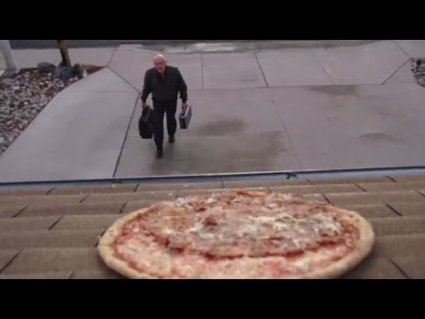 Why is a home in Albuquerque being pelted with pizza?