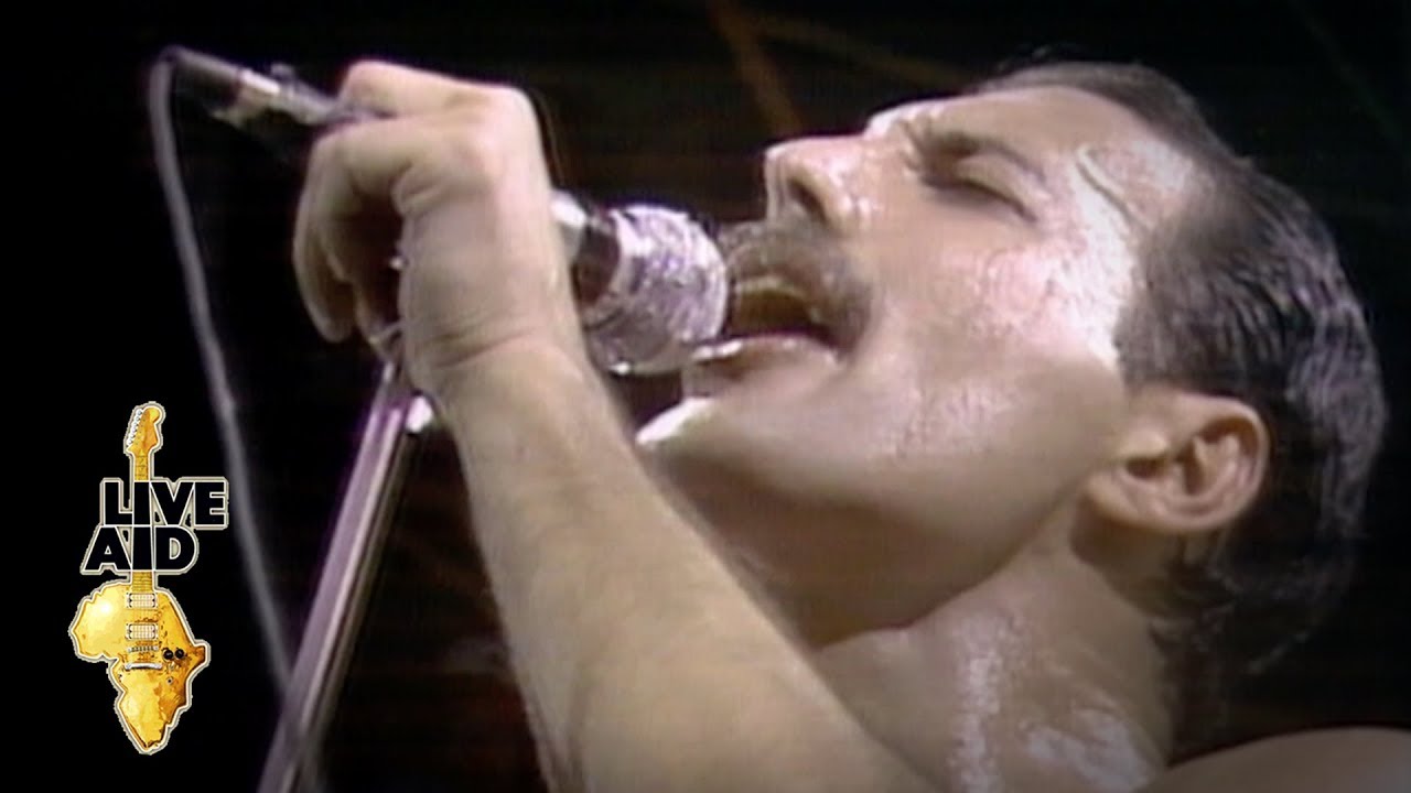 Queen's Legendary Live Aid Performance of 'We Are The Champions' 🎤