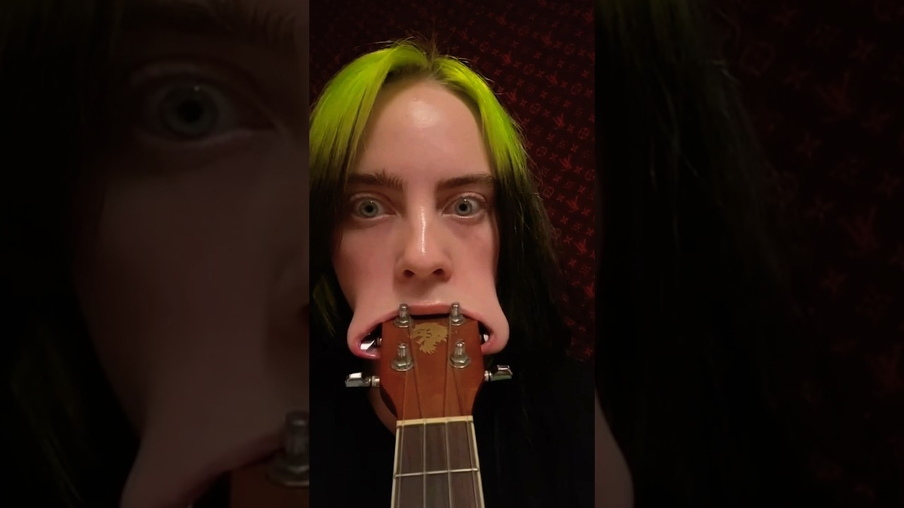 Billie Eilish Surprises Fans by Fitting Entire Ukulele Head in Her Mouth Twice! 🎶😂