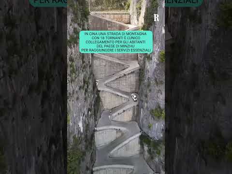 In Cina una strada di montagna con 18 tornanti collega un paese ai servizi essenziali