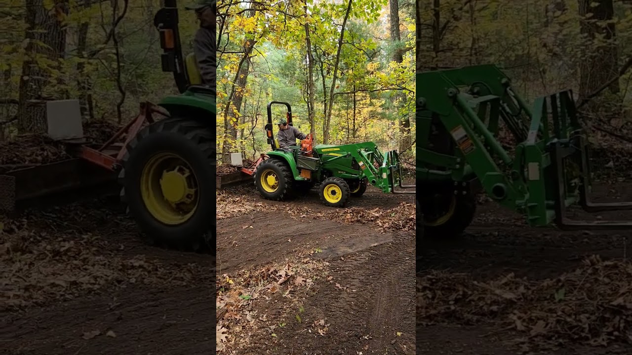 John Deere 3025e Pushing Debris