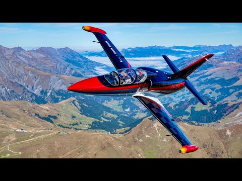 L-39 Flight. Swiss Warbird spectacular Oldtimer Planes over the beautiful swiss alps