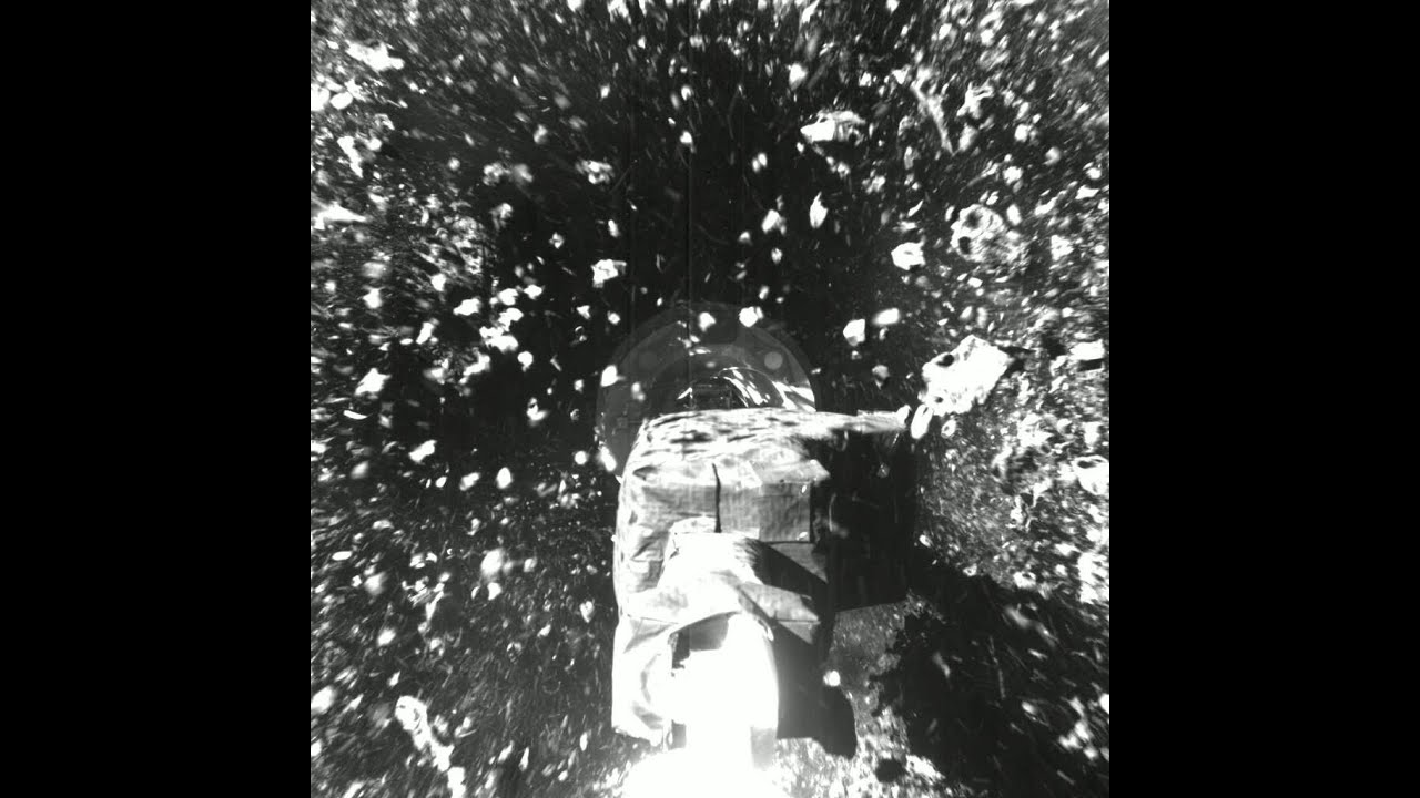 Stunning View of OSIRIS-REx's Sample Collection at Asteroid Bennu π