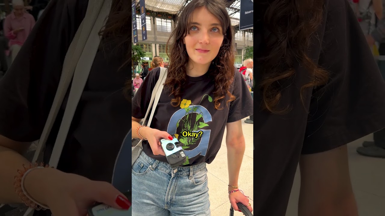 Sharing Disposable Cameras with Strangers at a Paris Train Station