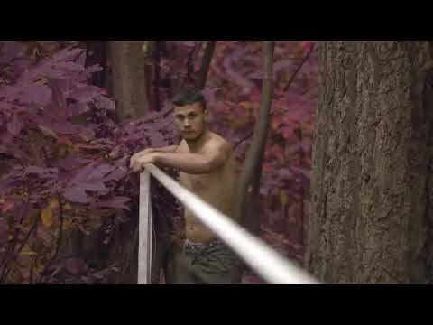 Slackline on violin music deep in the forest