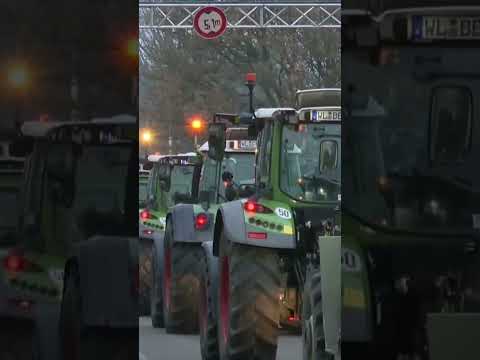 German farmers protest against government plan to cut tax breaks for diesel