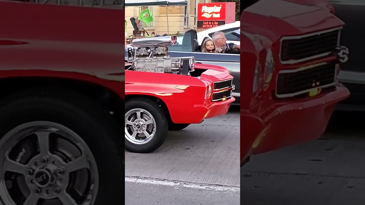 Stunning Red Classic Car Steals the Show at Saint Clair Shores Charity Cruise 🚗