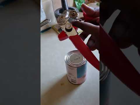 How to open a can with can opener#can opener#evaporated milk#Music: TropicMusician: Jeff Kaale