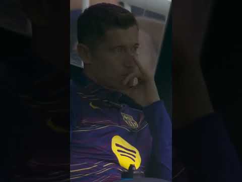 Robert Lewandowski watching along from the bench