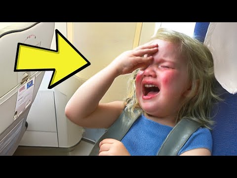 The GIRL caught everyone's attention during the flight because of her strange behavior.