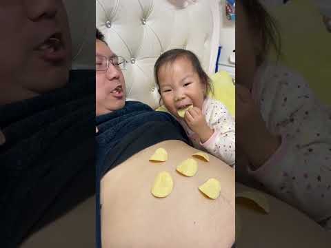 Fighting with Dad for potato chips, Dad taking care of baby, Men taking care of baby series, Dad