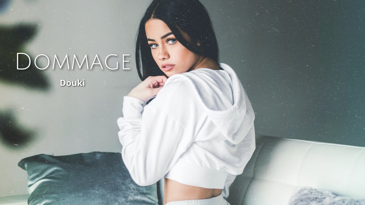 Douki - Dommage 🎶 Official Lyrics & Music Video