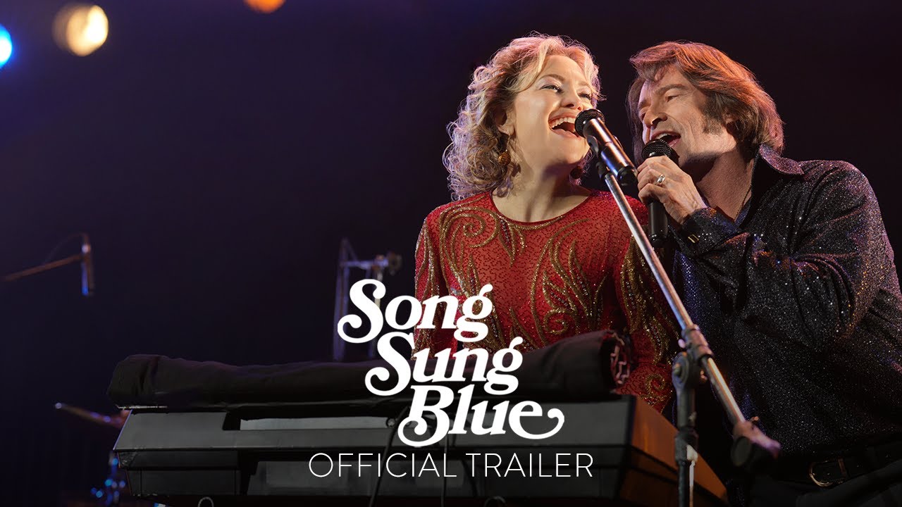 Song Sung Blue in Theaters This Christmas 🎶
