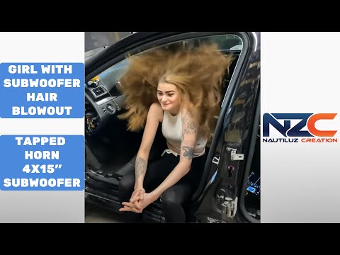 Girl with hair blowout by tapped horn Ground Zero 4x15" GZNW neodym subwoofer
