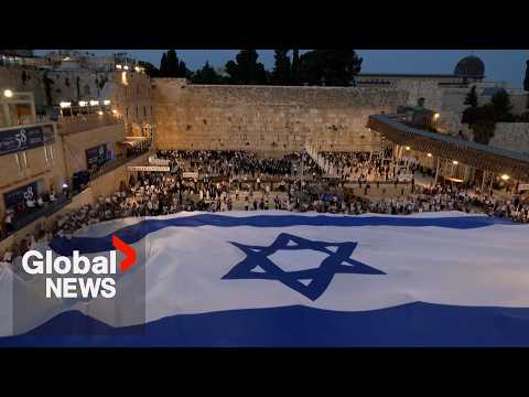 Violence breaks out as thousands of Israelis celebrate Jerusalem Day