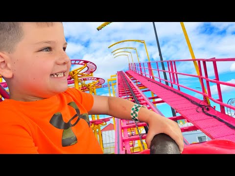 FIRST ROLLER COASTER RIDE at FUN FAIR! CALEB RIDES OUTDOOR AMUSEMENT PARK RIDES for KIDS with MOM!