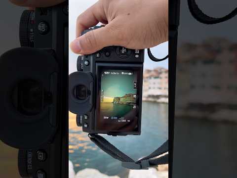 Through the lens, a whole new world unfolds… 📸✨#FujifilmMagic #cinematicvibes  #streetphotography