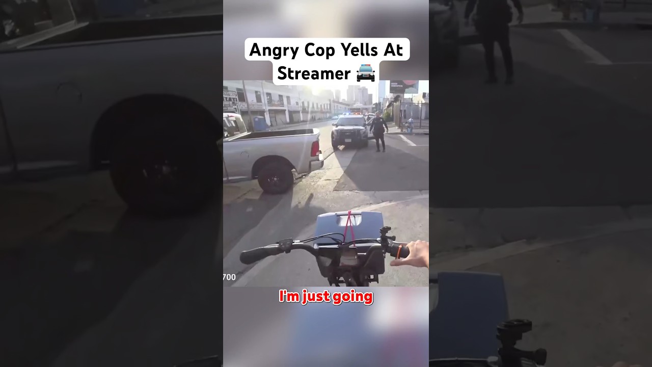 🚓 Shocking Moment as Cop Yells at Twitch Streamer During Bike Ride!