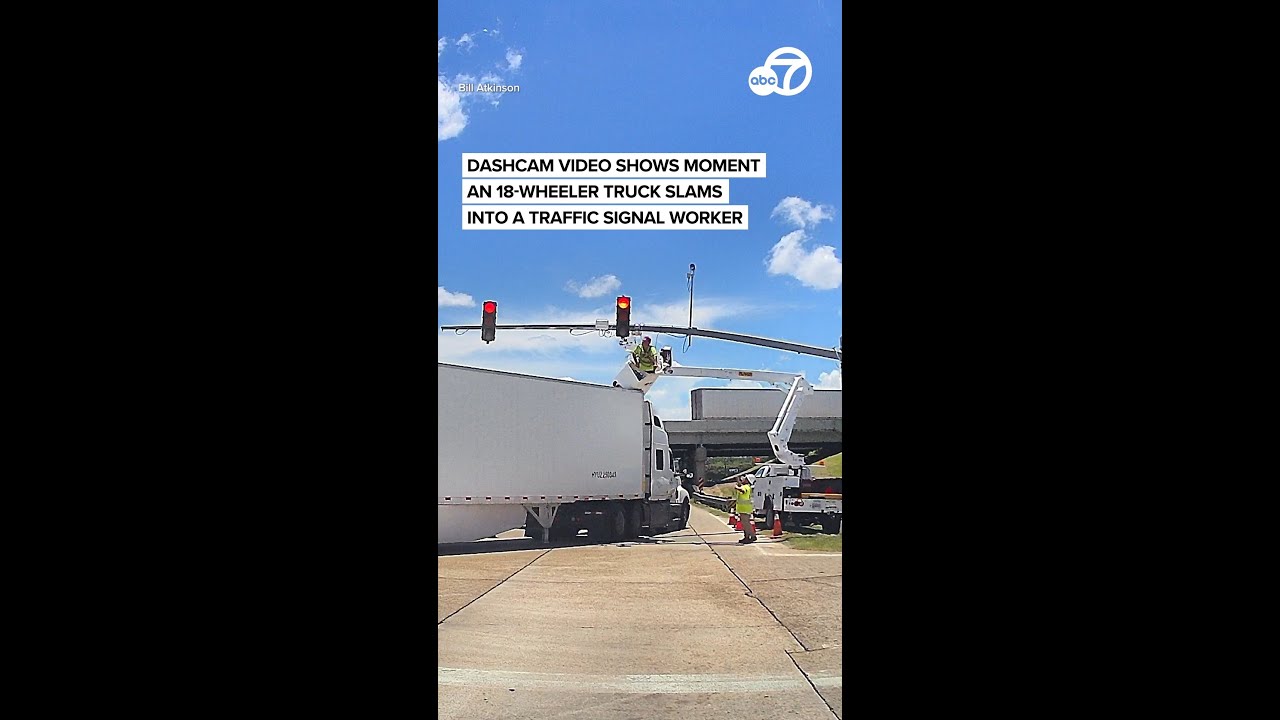 Shocking Dashcam Footage: Truck Strikes Traffic Signal Worker 🚧