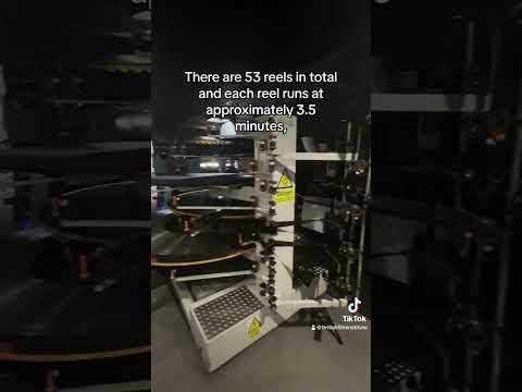 Oppenheimer 70mm film reel running in the BFI IMAX