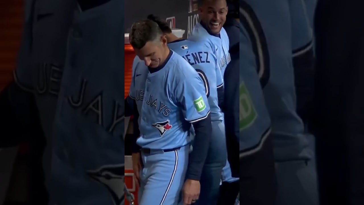 Ernie Clement reacts to Max Scherzer telling the Blue Jays coach to go away