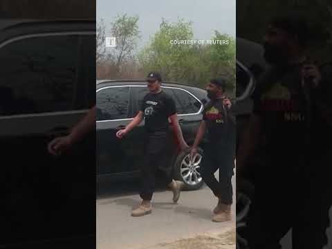 Imran Khan and wife arrive at Pakistan court seeking bail