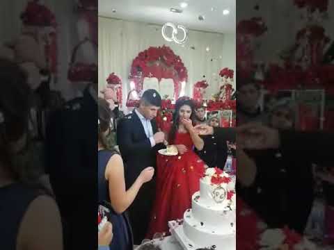 Angry groom loses it during wedding cake cutting ceremony, leaving guests and bride horrified
