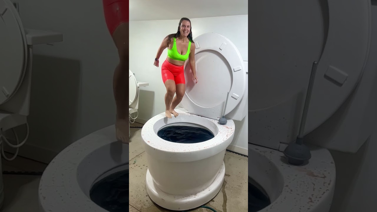 Epic Slow Motion Jump into the World's Largest Giant Toilet Pool! 💦