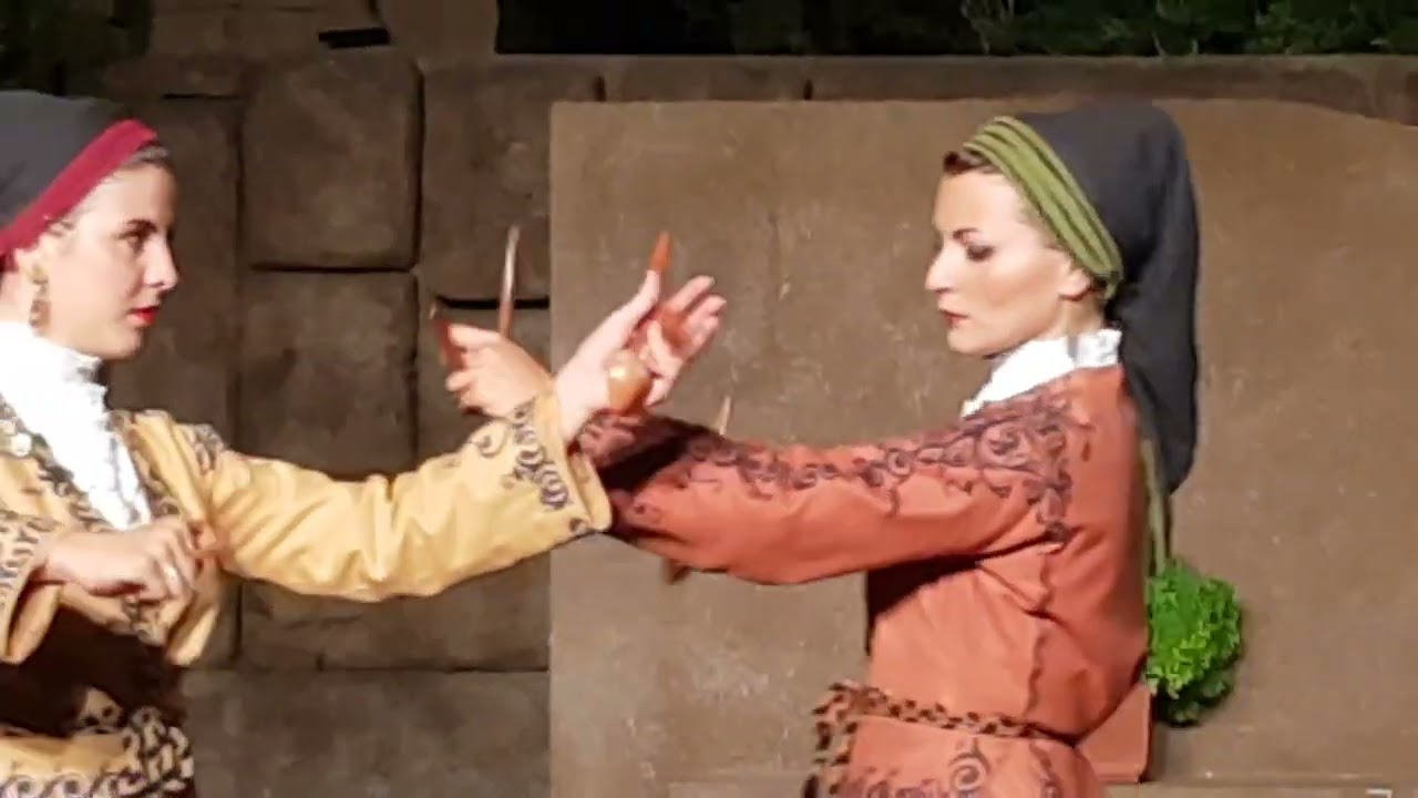 Traditional Greek Folk Dance with Wooden Spoon