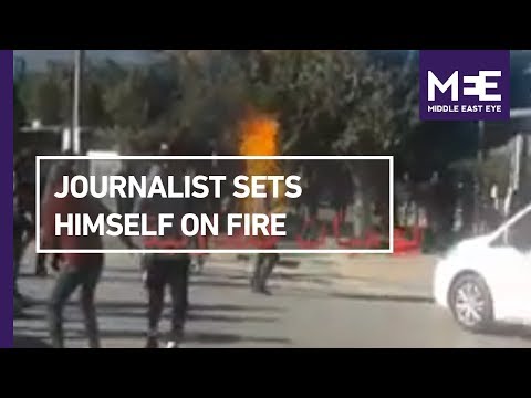 Journalist in Tunisia sets himself on fire, triggers protests