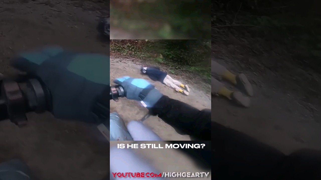 Unusual Scene: Man Crawling in Forest Amidst Biker Context