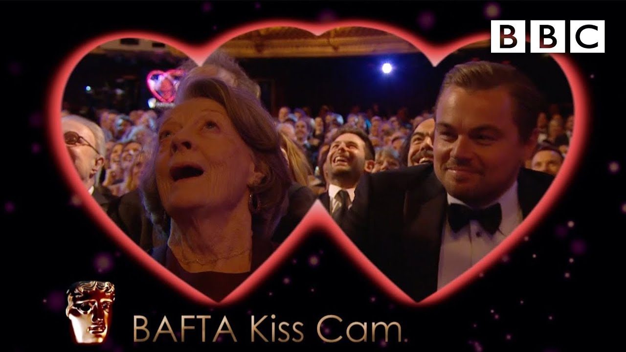 Leonardo DiCaprio & Dame Maggie Smith Share a Kiss on Camera at BAFTA 2016 🎬