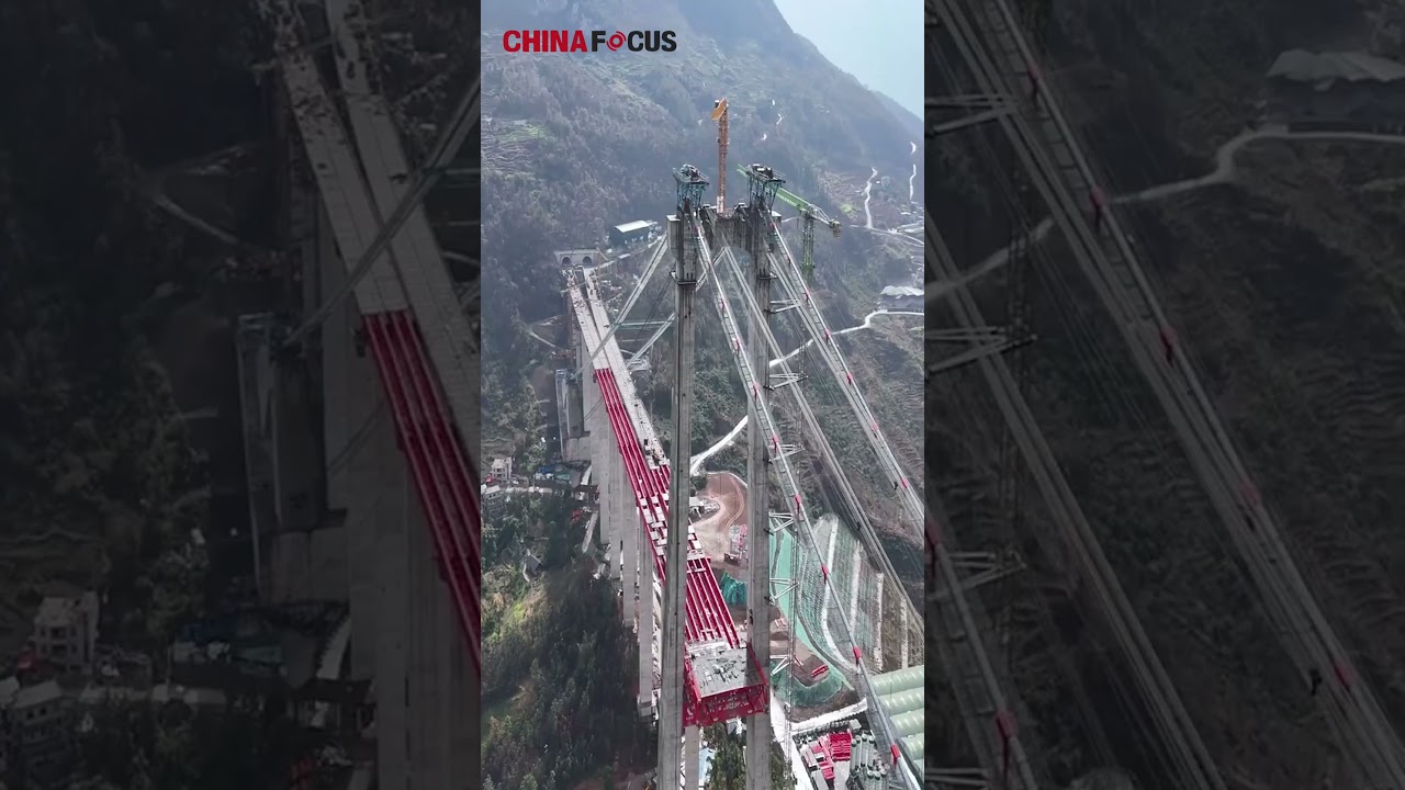 Huajiang Canyon Bridge: World's Tallest Under Construction 🌉